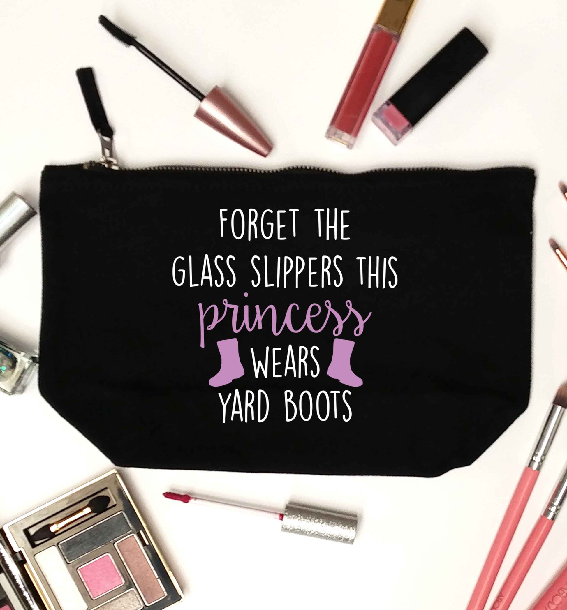 Forget the glass slippers this princess wears yard boots black makeup bag