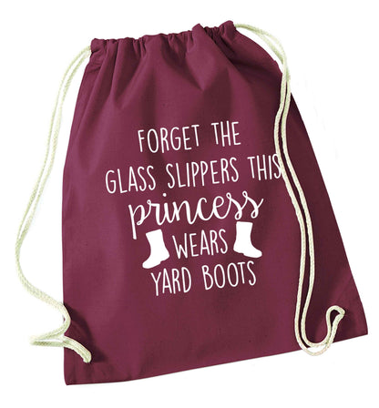 Forget the glass slippers this princess wears yard boots maroon drawstring bag