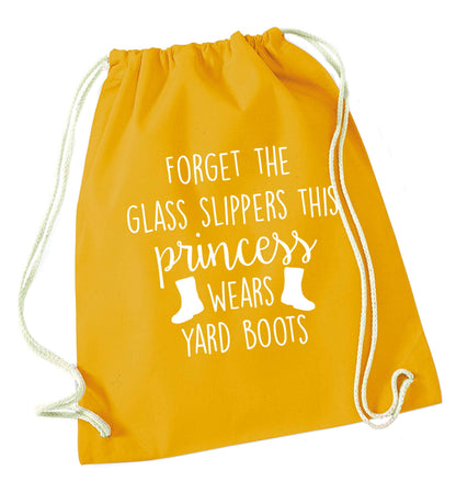 Forget the glass slippers this princess wears yard boots mustard drawstring bag