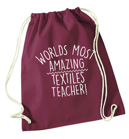 Worlds most amazing textiles teacher maroon drawstring bag