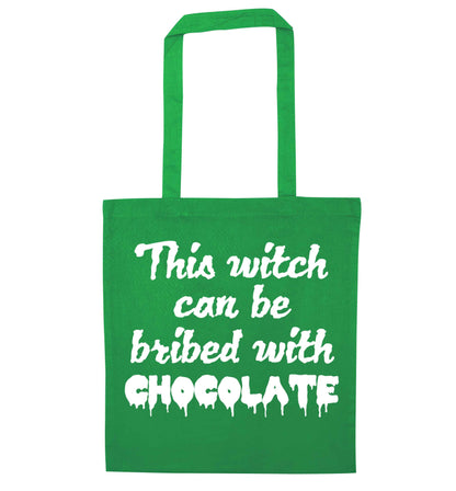 This witch can be bribed with chocolate green tote bag