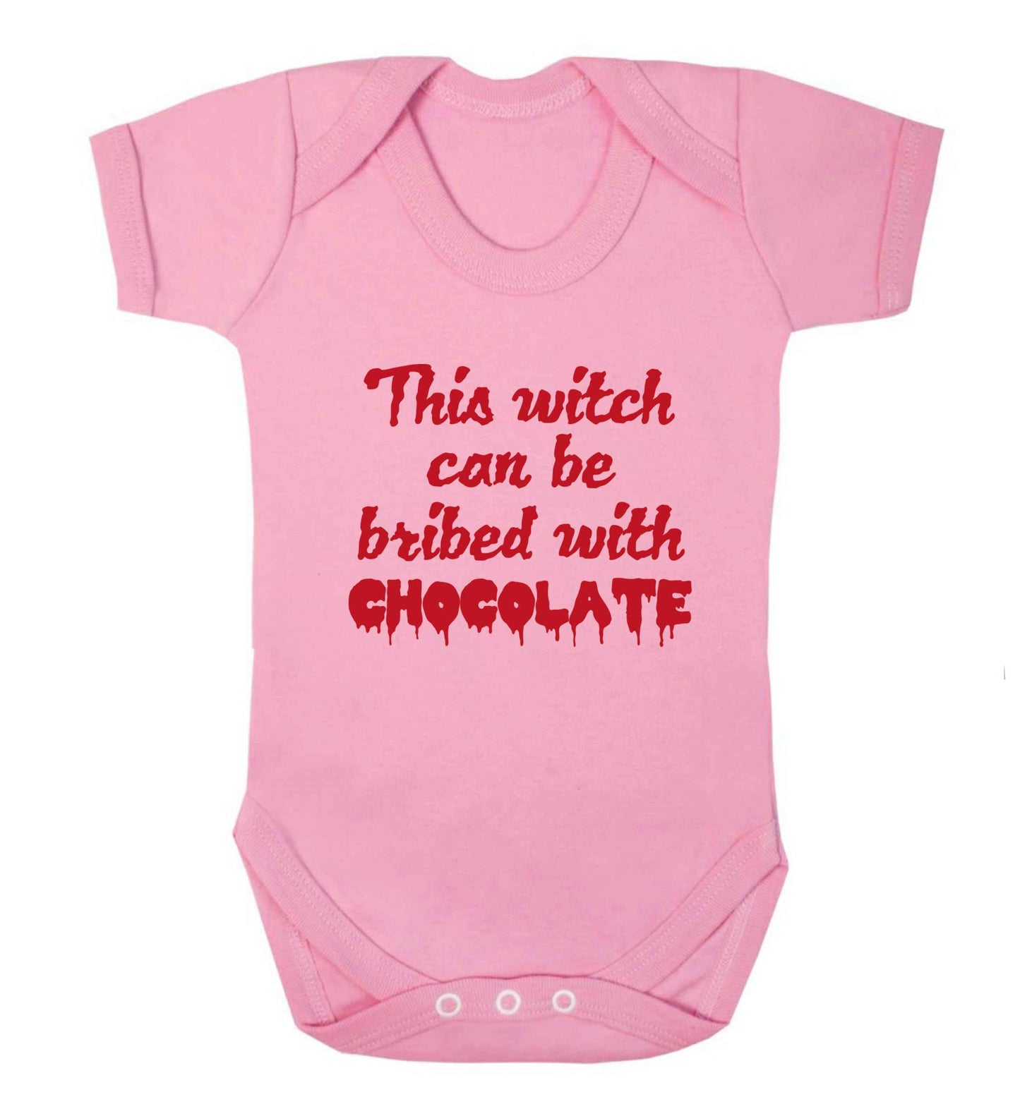 This witch can be bribed with chocolate baby vest pale pink 18-24 months