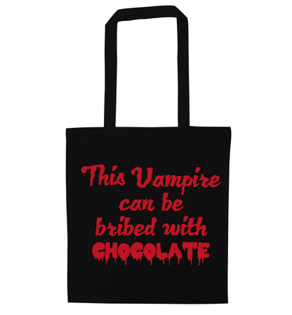 This vampire can be bribed with chocolate black tote bag