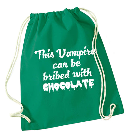 This vampire can be bribed with chocolate green drawstring bag