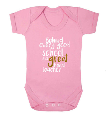 Behind every good school is a great head teacher baby vest pale pink 18-24 months