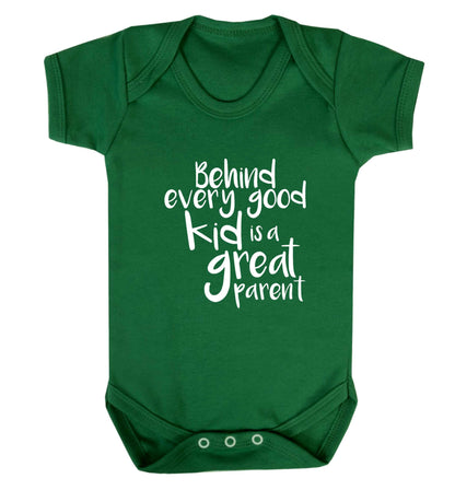 Behind every good kid is a great parent baby vest green 18-24 months
