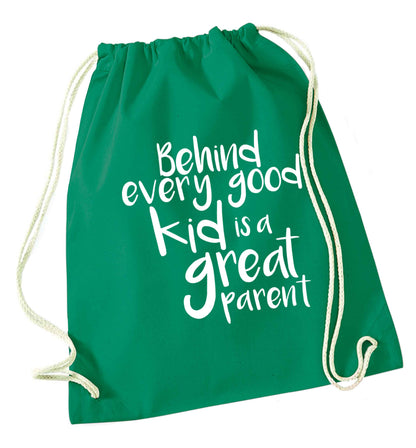 Behind every good kid is a great parent green drawstring bag