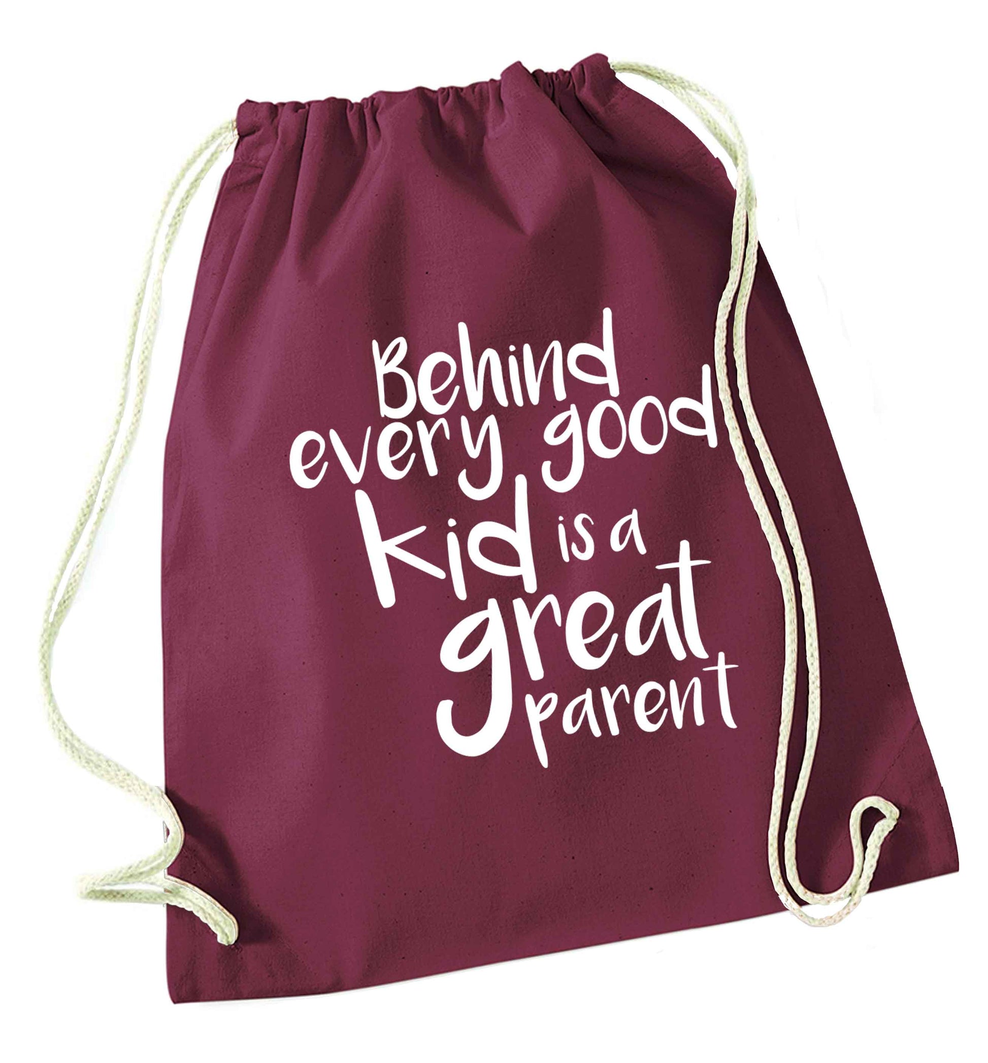 Behind every good kid is a great parent maroon drawstring bag