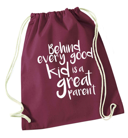 Behind every good kid is a great parent maroon drawstring bag