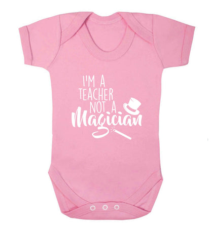 I'm a teacher not a magician baby vest pale pink 18-24 months
