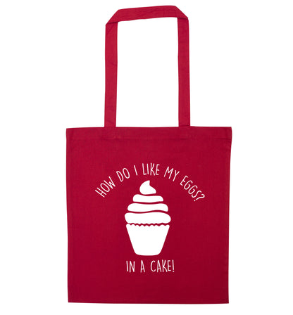 How do I like my eggs? In a cake! red tote bag