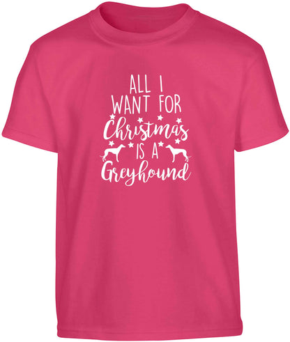 All I want for Christmas is a greyhound Children's pink Tshirt 12-13 Years