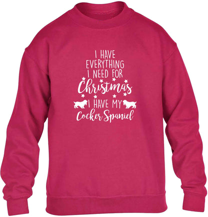 I have everything I need for Christmas I have my cocker spaniel children's pink sweater 12-13 Years