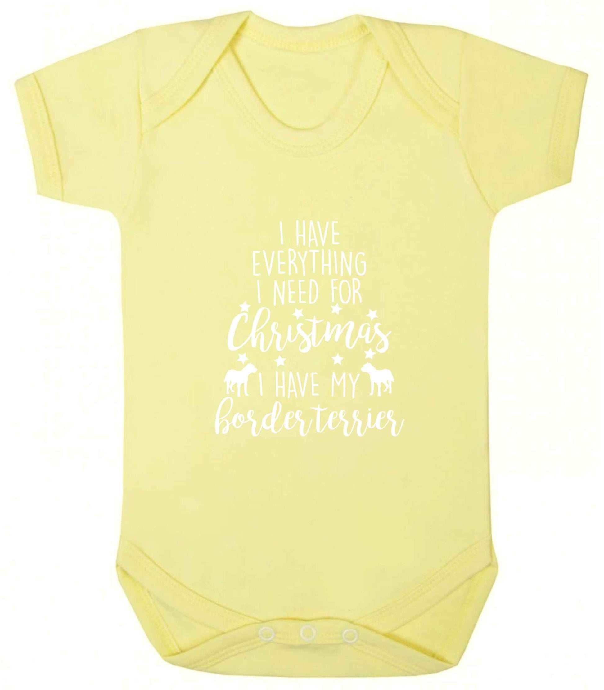 I have everything I need for Christmas I have my border terrier baby vest pale yellow 18-24 months