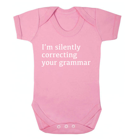 I'm silently correcting your grammar  Baby Vest pale pink 18-24 months