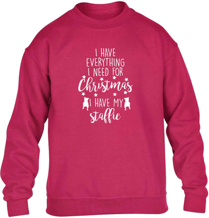 I have everything I need for Christmas I have my staffie children's pink sweater 12-13 Years