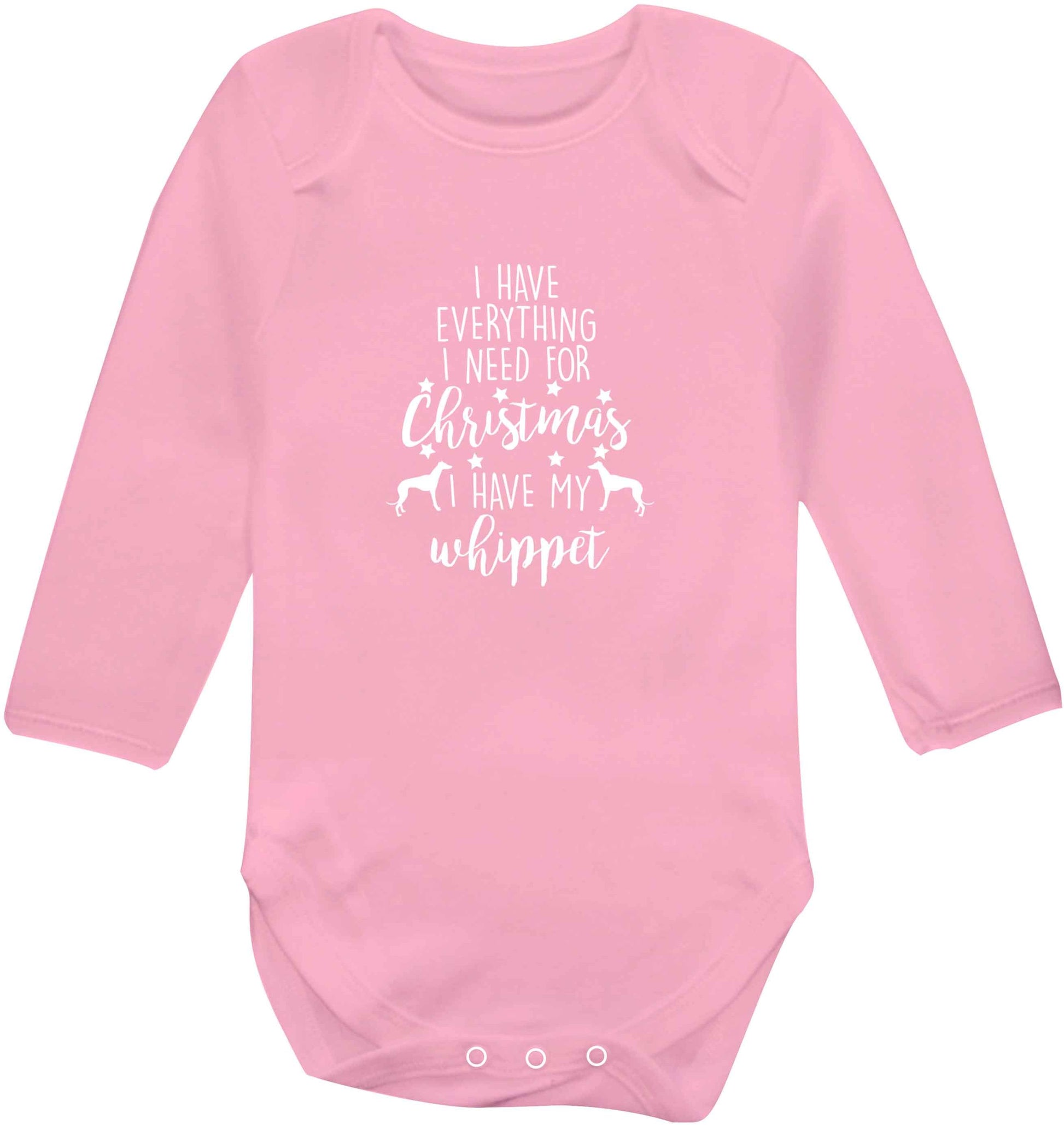 I have everything I need for Christmas I have my whippet baby vest long sleeved pale pink 6-12 months