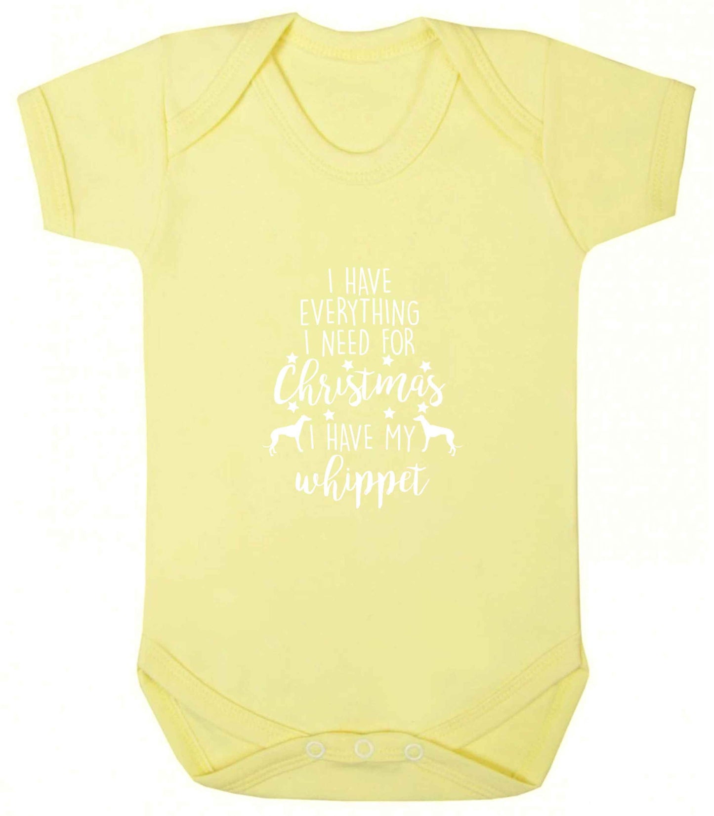 I have everything I need for Christmas I have my whippet baby vest pale yellow 18-24 months