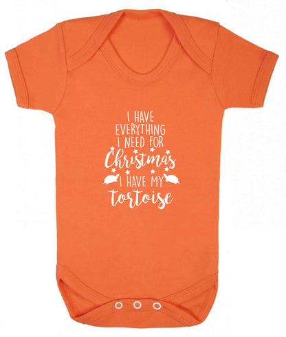 I have everything I need for Christmas I have my tortoise baby vest orange 18-24 months