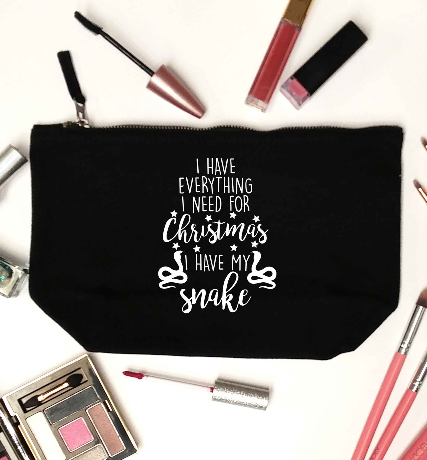 I have everything I need for Christmas I have my snake black makeup bag