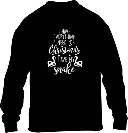 I have everything I need for Christmas I have my snake children's black sweater 12-13 Years