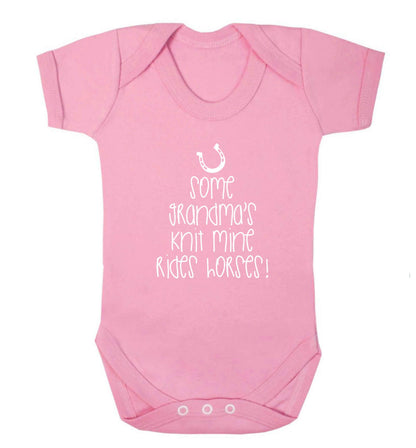 Some grandma's knit mine rides horses baby vest pale pink 18-24 months