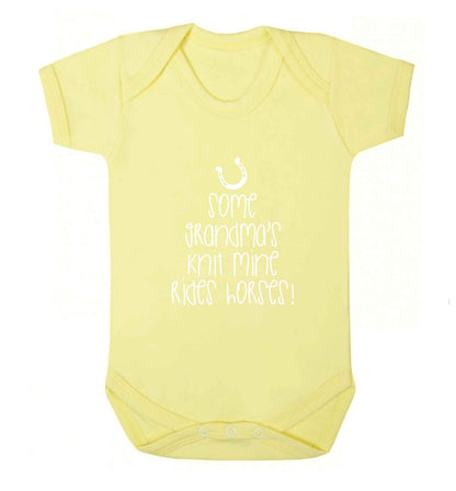 Some grandma's knit mine rides horses baby vest pale yellow 18-24 months