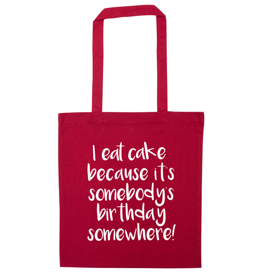 I eat cake because it's somebody's birthday somewhere! red tote bag