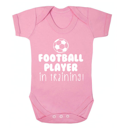 Football player in training Baby Vest pale pink 18-24 months