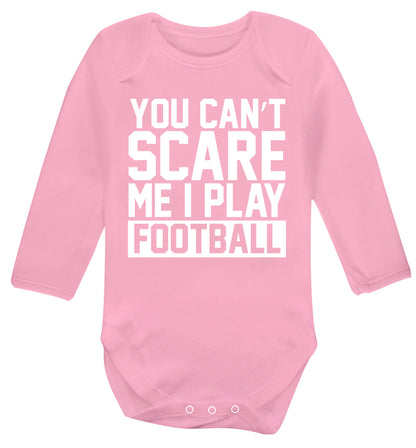 You can't scare me I play football Baby Vest long sleeved pale pink 6-12 months