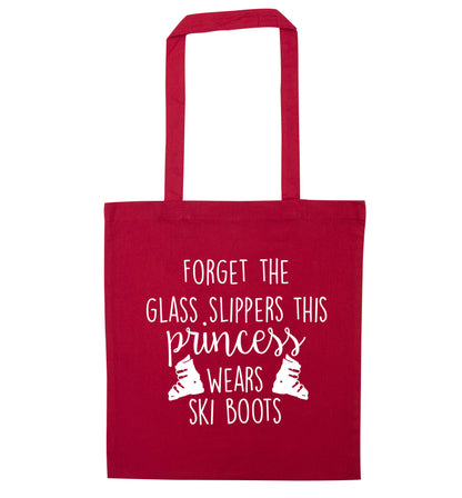Forget the glass slippers this princess wears ski boots red tote bag