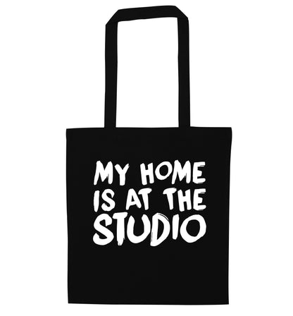 My home is at the studio black tote bag