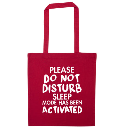Please do not disturb sleeping mode has been activated red tote bag