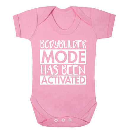 Bodybuilder mode activated Baby Vest pale pink 18-24 months