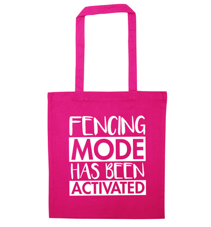 Fencing mode activated pink tote bag
