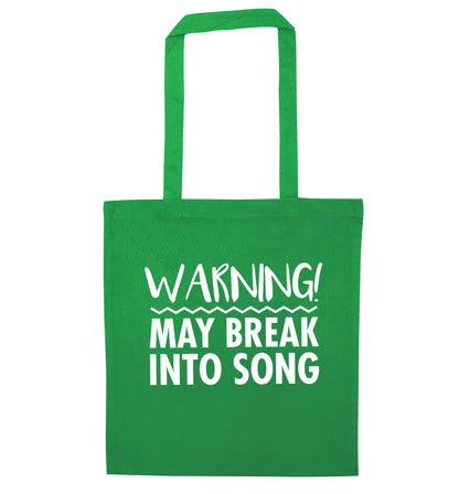 Warning may break into song green tote bag