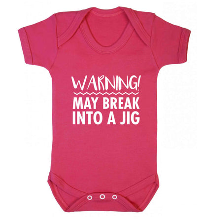 Warning may break into a jig baby vest dark pink 18-24 months