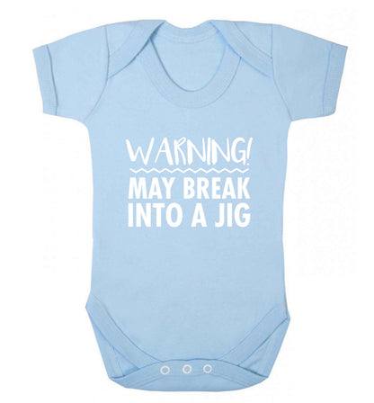 Warning may break into a jig baby vest pale blue 18-24 months