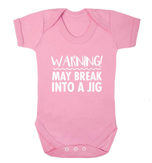 Warning may break into a jig baby vest pale pink 18-24 months