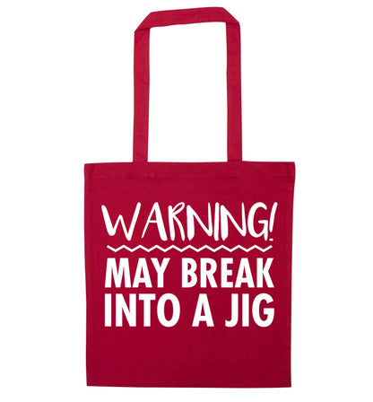 Warning may break into a jig red tote bag