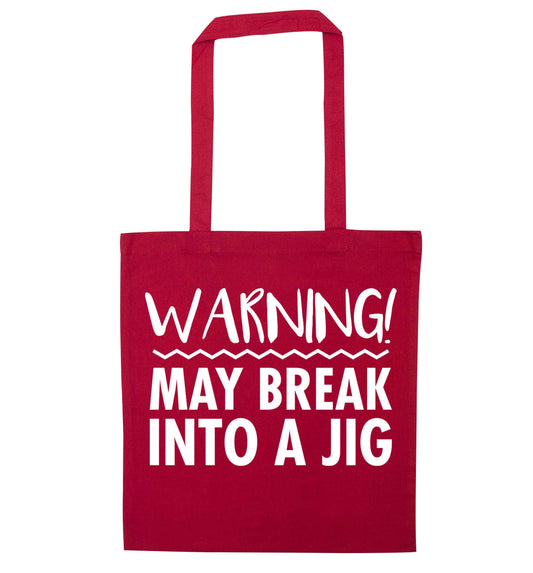 Warning may break into a jig red tote bag
