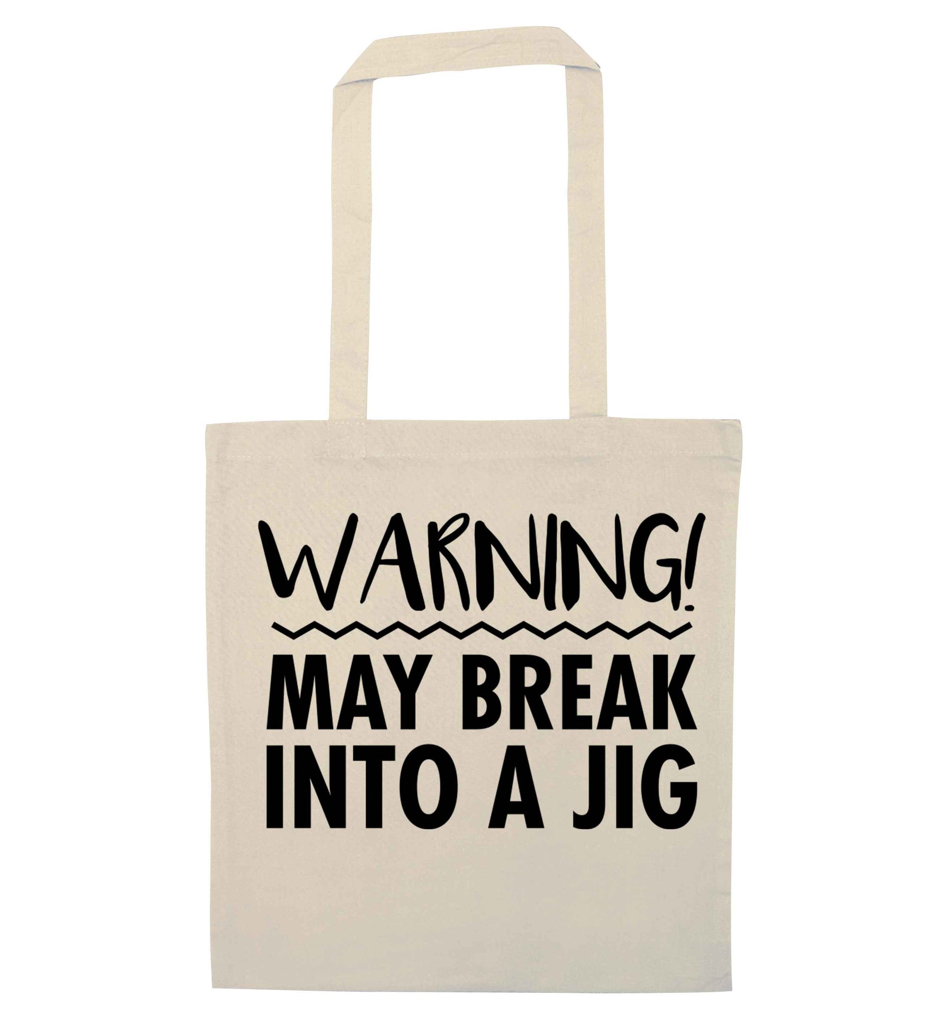 Warning may break into a jig natural tote bag