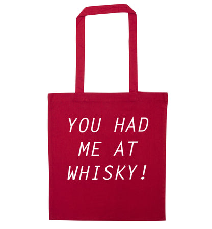 You had me at whisky red tote bag