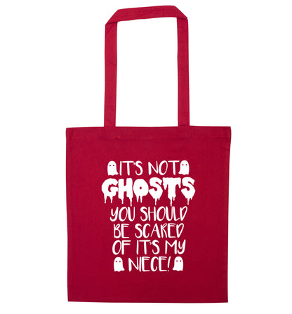 It's not ghosts you should be scared of it's my niece! red tote bag
