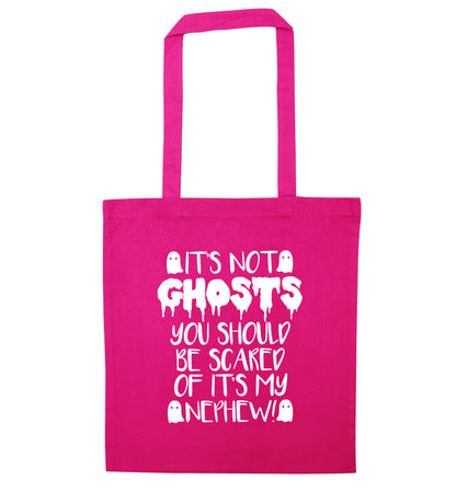 It's not ghosts you should be scared of it's my nephew! pink tote bag