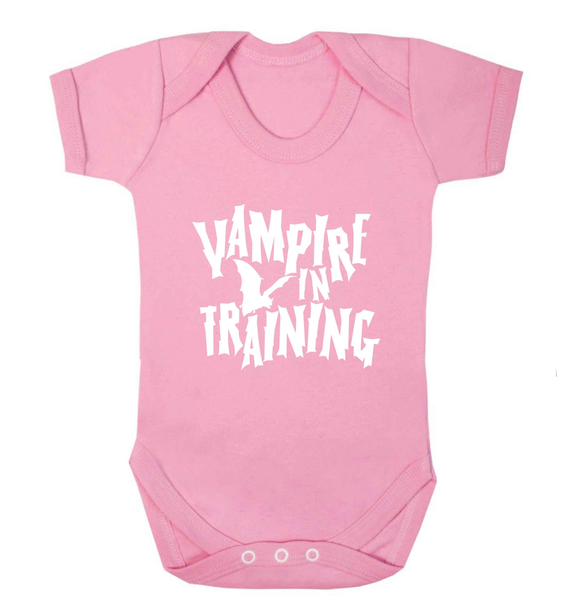 Vampire in training baby vest pale pink 18-24 months