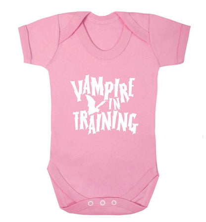 Vampire in training baby vest pale pink 18-24 months