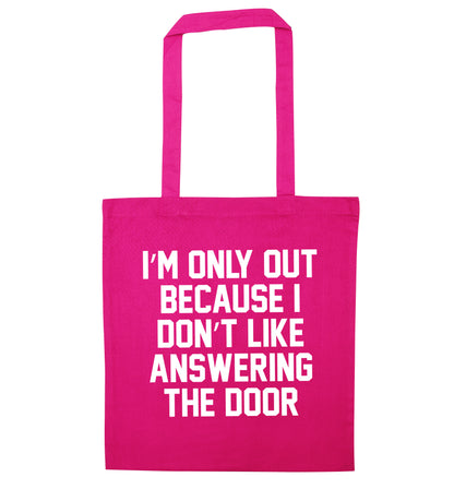 I'm only out because I don't like answering the door pink tote bag