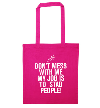 Don't mess with me my job is to stab people! pink tote bag