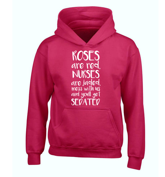 Roses are red, nurses are jaded, mess with us and you'll get sedated children's pink hoodie 12-14 Years